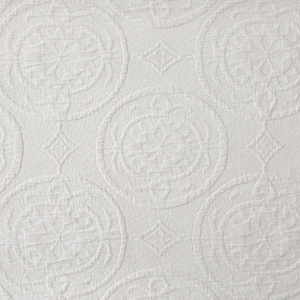 VERONA'S RAISED MEDALLION MATELASSÉ fabric detail